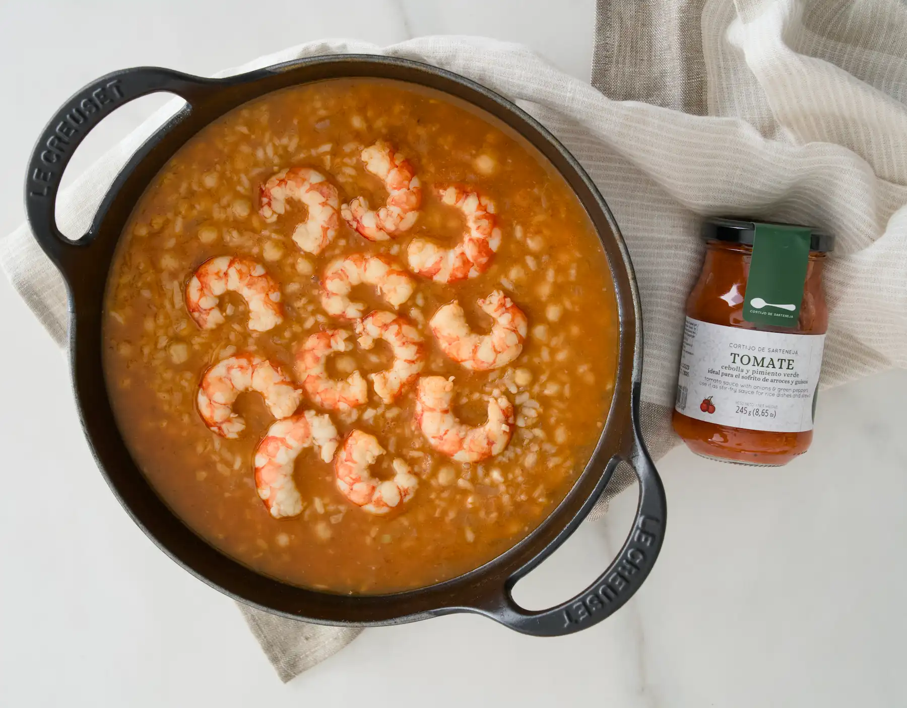 arroz caldoso con gambones y tomate frito sarteneja